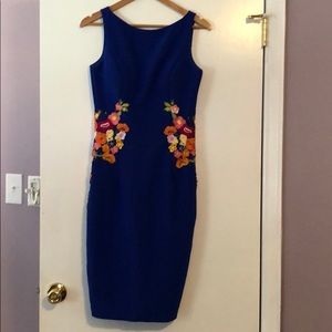 Blue cocktail dress with floral embroidery